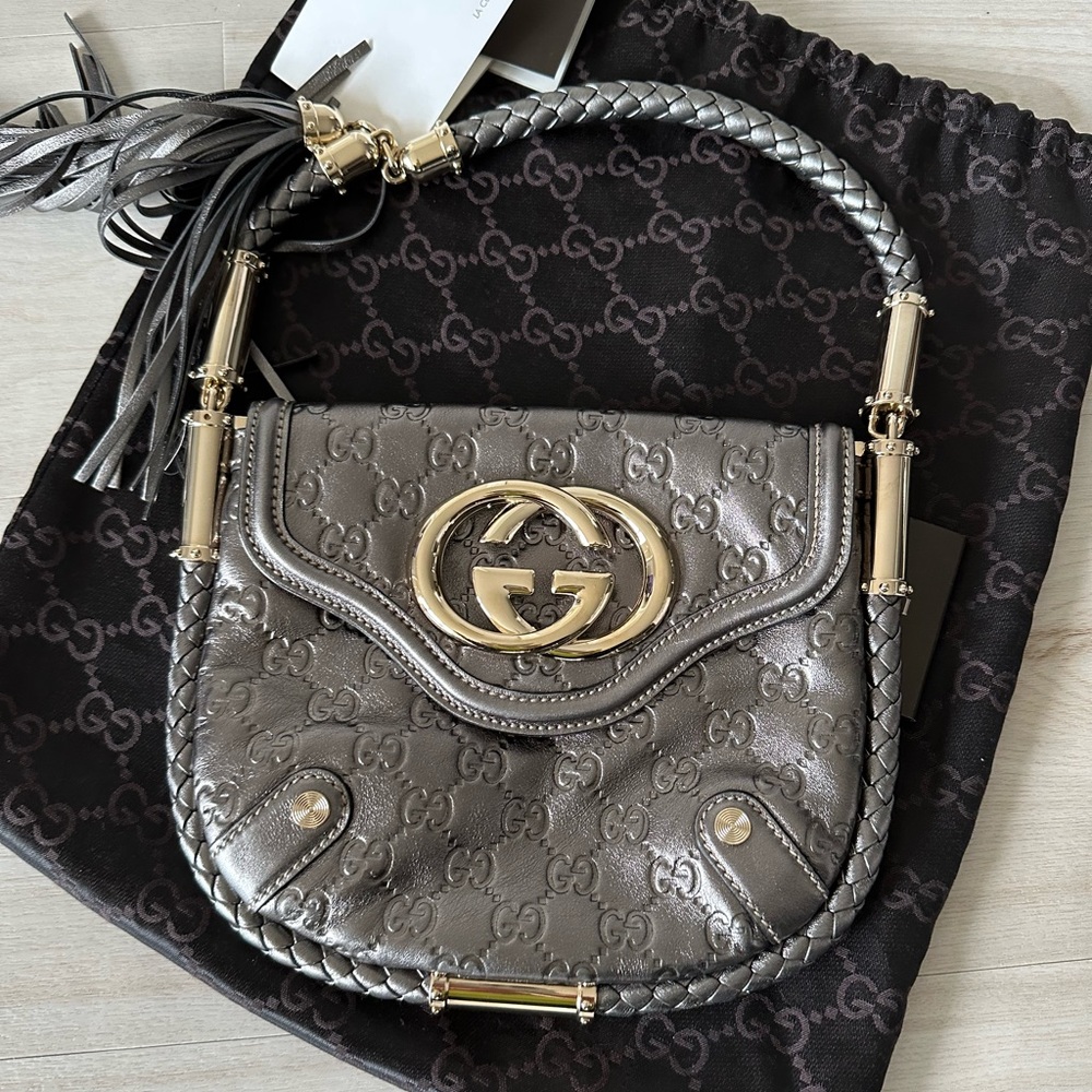 Authentic one of a kind leather Gucci Britt tassle shoulder bag small
